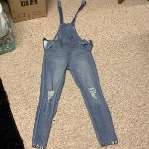 Distressed overall jeans